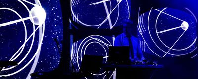 Mr B performing live — stage visuals and projection design